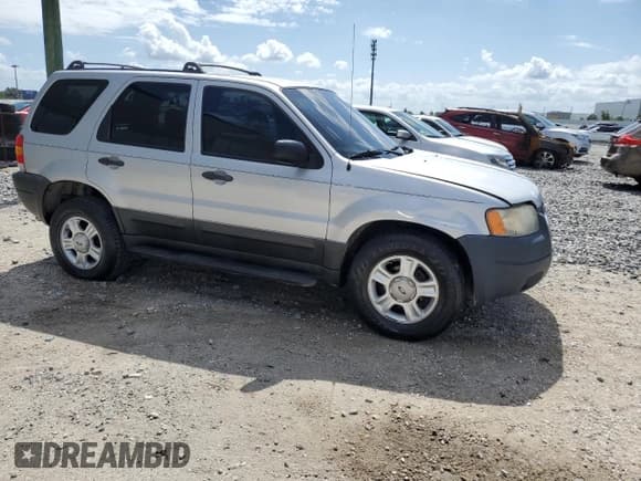 ✅ 2003 Ford Escape XLT Popular • VIN: 1FMYU03193KA69270 • Lot: 85519935. Listed on Copart with 143,614 mi. Free auction sales archive from the USA and detailed vehicle history report at DreamBid. Image 4.