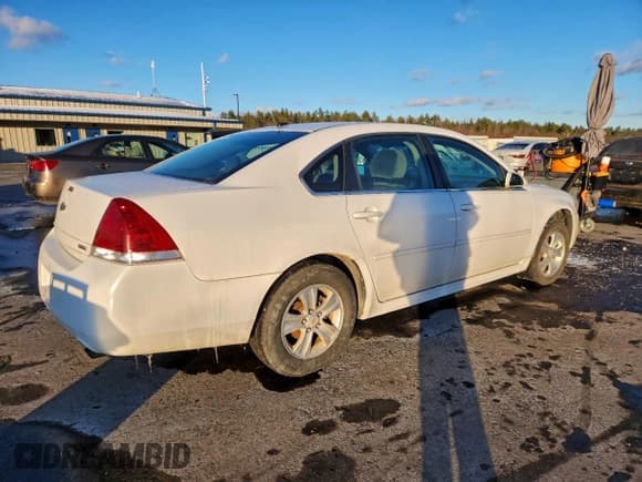 ✅ 2014 Chevrolet Impala LS • VIN: 2G1WA5E33E1125070 • Lot: 95118295. Listed on Copart with 86,756 mi. Free auction sales archive from the USA and detailed vehicle history report at DreamBid. Image 3.