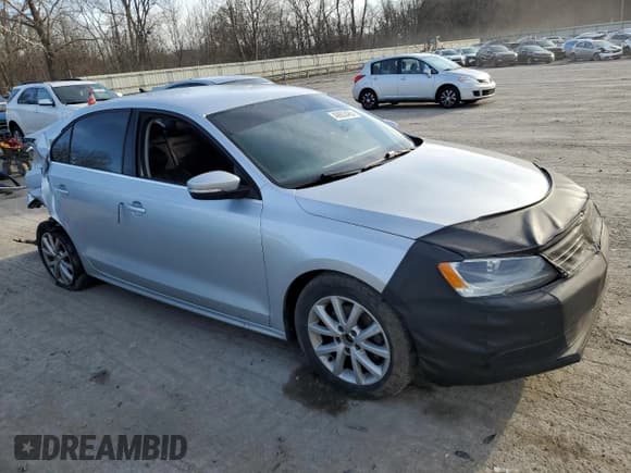 ✅ 2013 Volkswagen Jetta SE • VIN: 3VWDX7AJ3DM216163 • Lot: 49603485. Listed on Copart with 148,045 mi. Free auction sales archive from the USA and detailed vehicle history report at DreamBid. Image 4.