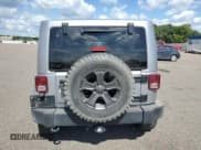 ✅ 2014 Jeep Wrangler Unlimited Sahara • VIN: 1C4BJWEG9EL108847 • Lot: 70563165. Wystawiony na Copart z przebiegiem 172 316 mil. Bezpłatny archiwum sprzedaży aukcyjnych z USA i szczegółowy raport historii pojazdu na DreamBid. Zdjęcie 6.