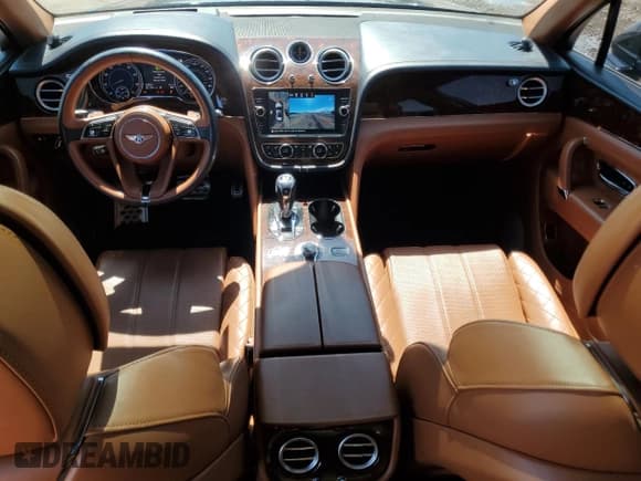 ✅ 2017 Bentley Bentayga W12 • VIN: SJAAC2ZV2HC014547 • Lot: 57488755. Listed on Copart with 63,359 mi. Free auction sales archive from the USA and detailed vehicle history report at DreamBid. Image 8.
