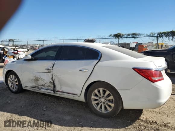✅ 2015 Buick LaCrosse • VIN: 1G4GA5GR2FF285976 • Lot: 80774054. Wystawiony na Copart z przebiegiem 96 470 mil. Bezpłatny archiwum sprzedaży aukcyjnych z USA i szczegółowy raport historii pojazdu na DreamBid. Zdjęcie 2.