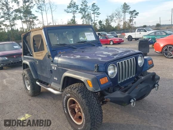 ✅ 2002 Jeep Wrangler X • VIN: 1J4FA39S62P740203 • Лот: 43787916. Опубликован ранее на IAAI с пробегом 216 725 миль. Бесплатный доступ к архиву аукционных продаж из США и подробный отчёт об истории автомобиля на DreamBid. Изображение 1.
