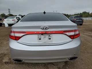 ✅ 2013 Hyundai Azera • VIN: KMHFH4JG6DA270769 • Лот: 86630765. Опубликован ранее на Copart с пробегом 133 252 миль. Бесплатный доступ к архиву аукционных продаж из США и подробный отчёт об истории автомобиля на DreamBid. Изображение 6.