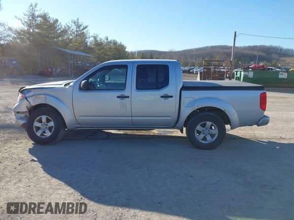✅ 2013 Nissan Frontier SL • VIN: 1N6AD0EV0DN731594 • Lot: 41702767. Listed on IAAI with 101,611 mi. Free auction sales archive from the USA and detailed vehicle history report at DreamBid. Image 14.