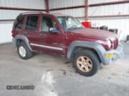 ✅ 2002 Jeep Liberty Sport • VIN: 1J8GL48K72W294086 • Lot: 43214710. Listed on IAAI with 120,097 mi. Free auction sales archive from the USA and detailed vehicle history report at DreamBid. Image 1.