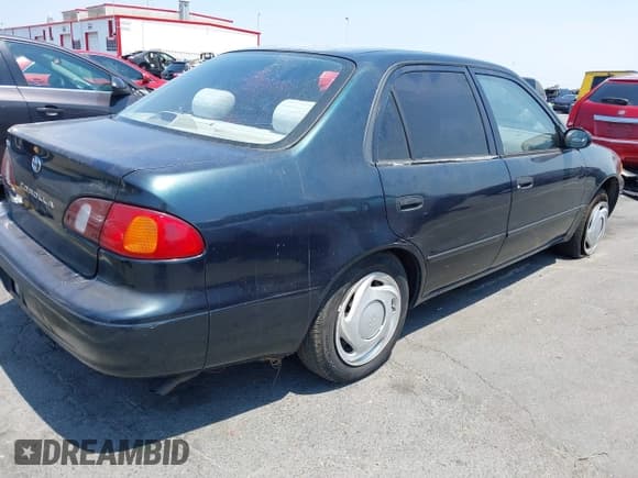 ✅ 1999 Toyota Corolla VE • VIN: 1NXBR12E4XZ251809 • Lot: 42910359. Listed on IAAI with 150,200 mi. Free auction sales archive from the USA and detailed vehicle history report at DreamBid. Image 4.