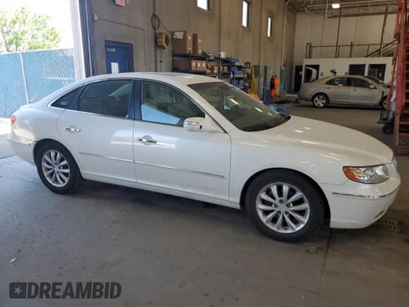 2008 Hyundai Azera Limited с VIN KMHFC46F88A290705, выставлен на аукционе Copart как лот 56882515 с пробегом 114 947 миль миль и Списание • Salvage title. История ставок и продаж доступна на DreamBid. Изображение 4.