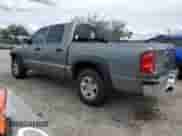 2006 Dodge Dakota SLT с VIN 1D7HE48KX6S526138, выставлен на аукционе Copart как лот 81651565 с пробегом 152 813 миль миль и Списание • Salvage title. История ставок и продаж доступна на DreamBid. Изображение 2.