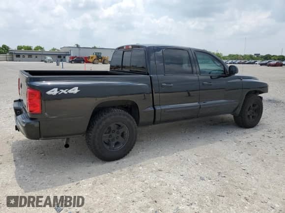 2007 Dodge Dakota SLT z VIN 1D7HW48K97S129325, wystawiony jako Copart lot #55304415 z przebiegiem 125 506 mil mil oraz Czysty tytuł • Clean title. Historia ofert i sprzedaży dostępna na DreamBid. Obrazek 3.