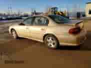 2003 Chevrolet Malibu LS z VIN 1G1NE52J13M708743, wystawiony jako Copart lot #84834634 z przebiegiem 292 197 mil mil oraz Czysty tytuł • Clean title. Historia ofert i sprzedaży dostępna na DreamBid. Obrazek 2.