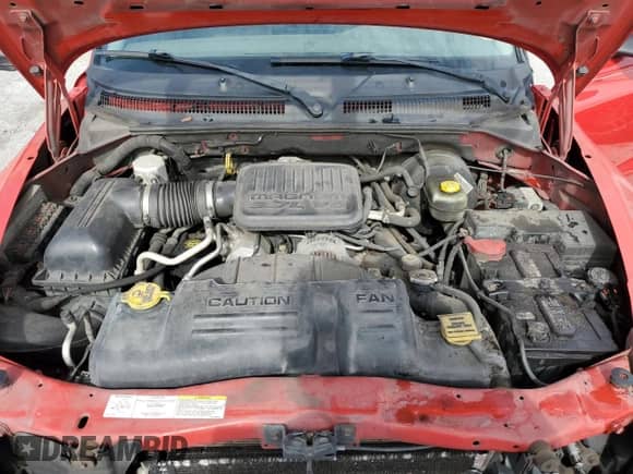 2004 Dodge Dakota Sport z VIN 1D7GL32K64S607803, wystawiony jako Copart lot #59599475 z przebiegiem 283 644 mil mil oraz Szkoda całkowita • Salvage title. Historia ofert i sprzedaży dostępna na DreamBid. Obrazek 11.