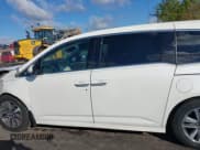 ✅ 2014 Honda Odyssey Touring • VIN: 5FNRL5H93EB043383 • Lot: 43571864. Listed on IAAI with 186,950 mi. Free auction sales archive from the USA and detailed vehicle history report at DreamBid. Image 15.