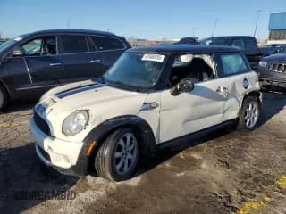 ✅ 2009 MINI Hardtop S • VIN: WMWMF73539TX40005 • Лот: 92608455. Опубликован ранее на Copart с пробегом 112 459 миль. Бесплатный доступ к архиву аукционных продаж из США и подробный отчёт об истории автомобиля на DreamBid. Изображение 1.