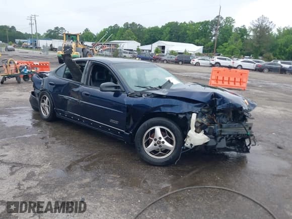 ✅ 2002 Pontiac Grand Prix GTP • VIN: 1G2WR521X2F185570 • Lot: 42246095. Wystawiony na IAAI z przebiegiem 235 457 mil. Bezpłatny archiwum sprzedaży aukcyjnych z USA i szczegółowy raport historii pojazdu na DreamBid. Zdjęcie 1.