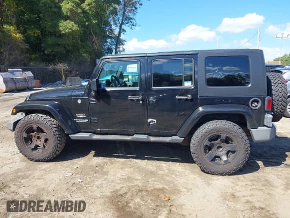 ✅ 2008 Jeep Wrangler Unlimited Sahara • VIN: 1J8GA59148L577444 • Lot: 43231472. Listed on IAAI with 292,511 mi. Free auction sales archive from the USA and detailed vehicle history report at DreamBid. Image 14.