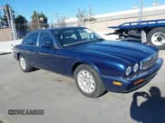 ✅ 2000 Jaguar XJ • VIN: SAJDA14C4YLF16529 • Lot: 41387819. Wystawiony na IAAI z przebiegiem 90 143 mil. Bezpłatny archiwum sprzedaży aukcyjnych z USA i szczegółowy raport historii pojazdu na DreamBid. Zdjęcie 1.