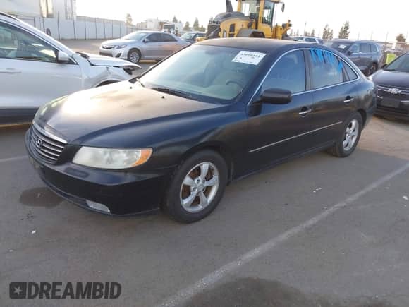 2006 Hyundai Azera SE with VIN KMHFC46F56A114031, listed as a IAAI auction lot 43610131 with 119,506 mi miles and . Bid and sale history available at DreamBid. Image 2.