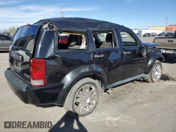 2011 Dodge Nitro Heat с VIN 1D4PT4GK3BW596969, выставлен на аукционе Copart как лот 82139254 с пробегом Не указан миль и Списание • Salvage title. История ставок и продаж доступна на DreamBid. Изображение 3.
