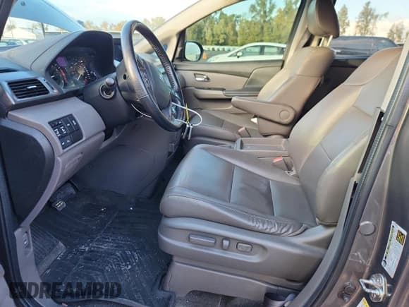 ✅ 2014 Honda Odyssey Touring • VIN: 5FNRL5H96EB054586 • Lot: 92015035. Wystawiony na Copart z przebiegiem 156 312 mil. Bezpłatny archiwum sprzedaży aukcyjnych z USA i szczegółowy raport historii pojazdu na DreamBid. Zdjęcie 7.