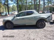 ✅ 2023 Hyundai Santa Cruz SEL • VIN: 5NTJBDAE1PH051702 • Lot: 43368036. Listed on IAAI with 29,225 mi. Free auction sales archive from the USA and detailed vehicle history report at DreamBid. Image 14.