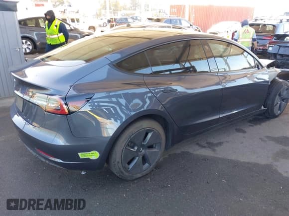 ✅ 2023 Tesla Model 3 • VIN: 5YJ3E1EAXPF506503 • Лот: 43459960. Опубликован ранее на IAAI с пробегом Не указан. Бесплатный доступ к архиву аукционных продаж из США и подробный отчёт об истории автомобиля на DreamBid. Изображение 4.
