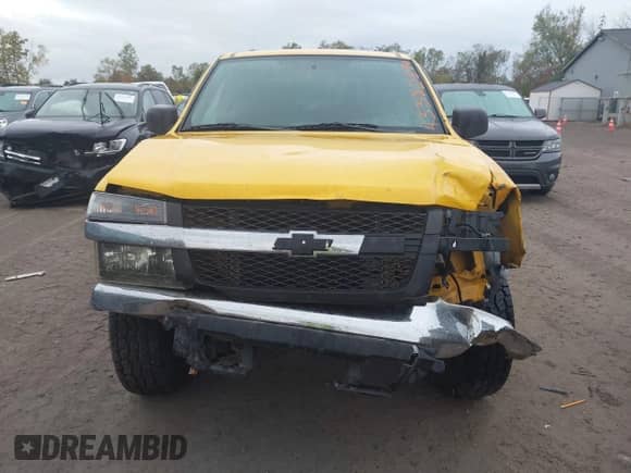 2005 Chevrolet Colorado 1SE LS Z71 z VIN 1GCDT136158272418, wystawiony jako IAAI lot #43382584 z przebiegiem 250 982 mil mil oraz . Historia ofert i sprzedaży dostępna na DreamBid. Obrazek 12.