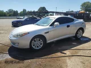 2008 Hyundai Tiburon GS с VIN KMHHM66D98U277685, выставлен на аукционе Copart как лот 65806505 с пробегом 145 826 миль миль и Списание • Salvage title. История ставок и продаж доступна на DreamBid. Изображение 1.