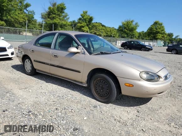 ✅ 1998 Mercury Sable GS • VIN: 1MEFM50U3WA606814 • Лот: 69998714. Опубликован ранее на Copart с пробегом 144 495 миль. Бесплатный доступ к архиву аукционных продаж из США и подробный отчёт об истории автомобиля на DreamBid. Изображение 4.