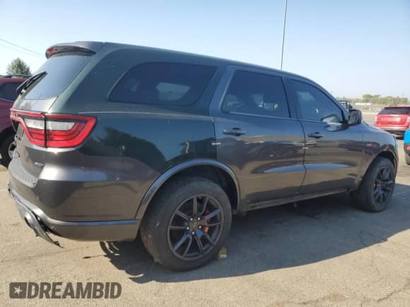 2018 Dodge Durango SRT z VIN 1C4SDJGJ2JC169843, wystawiony jako Copart lot #71884965 z przebiegiem Nie podano mil oraz Czysty tytuł • Clean title. Historia ofert i sprzedaży dostępna na DreamBid. Obrazek 3.