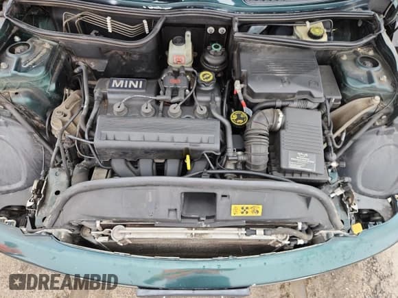 ✅ 2005 MINI Convertible • VIN: WMWRF33465TG11405 • Lot: 64247515. Wystawiony na Copart z przebiegiem 91 830 mil. Bezpłatny archiwum sprzedaży aukcyjnych z USA i szczegółowy raport historii pojazdu na DreamBid. Zdjęcie 11.