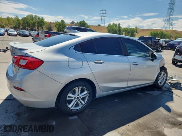 ✅ 2017 Chevrolet Cruze LT • VIN: 1G1BE5SM8H7194084 • Lot: 70013605. Listed on Copart with 102,890 mi. Free auction sales archive from the USA and detailed vehicle history report at DreamBid. Image 3.
