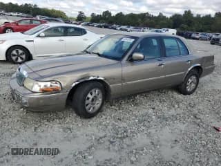 ✅ 2003 Mercury Grand Marquis LS Premium • VIN: 2MEHM75W73X608020 • Лот: 84363205. Опубликован ранее на Copart с пробегом 220 703 миль. Бесплатный доступ к архиву аукционных продаж из США и подробный отчёт об истории автомобиля на DreamBid. Изображение 1.