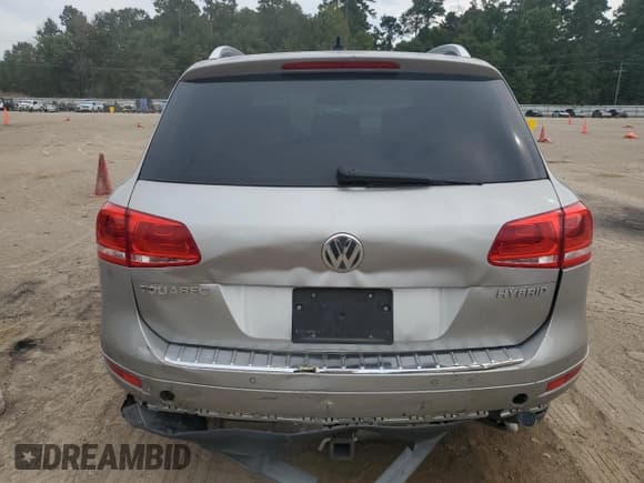 ✅ 2012 Volkswagen Touareg • VIN: WVGEG9BP0CD008849 • Lot: 68694975. Listed on Copart with Not provided. Free auction sales archive from the USA and detailed vehicle history report at DreamBid. Image 6.