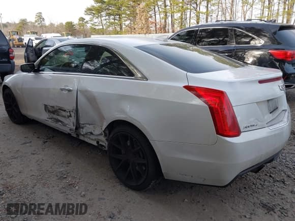 ✅ 2015 Cadillac ATS Standard AWD • VIN: 1G6AG1RX0F0121032 • Lot: 43892311. Wystawiony na IAAI z przebiegiem 188 931 mil. Bezpłatny archiwum sprzedaży aukcyjnych z USA i szczegółowy raport historii pojazdu na DreamBid. Zdjęcie 6.