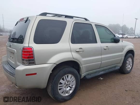 2005 Mercury Mariner Luxury z VIN 4M2YU56175DJ10333, wystawiony jako IAAI lot #41644749 z przebiegiem 174 477 mil mil oraz . Historia ofert i sprzedaży dostępna na DreamBid. Obrazek 4.