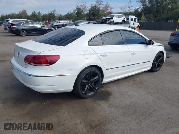 ✅ 2013 Volkswagen CC R-Line • VIN: WVWBP7AN2DE562112 • Lot: 43698298. Listed on IAAI with 115,777 mi. Free auction sales archive from the USA and detailed vehicle history report at DreamBid. Image 4.