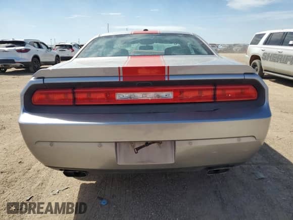 2014 Dodge Challenger SXT z VIN 2C3CDYAG0EH139872, wystawiony jako Copart lot #68122374 z przebiegiem 113 207 mil mil oraz Szkoda całkowita • Salvage title. Historia ofert i sprzedaży dostępna na DreamBid. Obrazek 6.