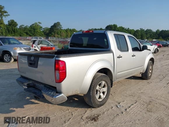 ✅ 2013 Nissan Frontier SL • VIN: 1N6AD0ERXDN737583 • Lot: 42406774. Listed on IAAI with 121,082 mi. Free auction sales archive from the USA and detailed vehicle history report at DreamBid. Image 4.
