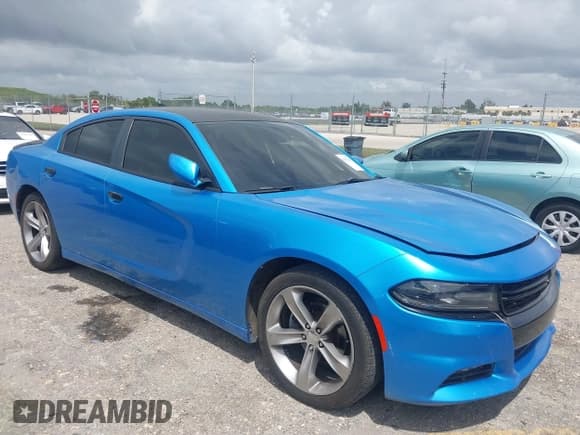 ✅ 2015 Dodge Charger SXT • VIN: 2C3CDXHG3FH827754 • Lot: 42012425. Listed on IAAI with 119,057 mi. Free auction sales archive from the USA and detailed vehicle history report at DreamBid. Image 1.
