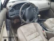 ✅ 1994 Mazda MX-6 • VIN: 1YVGE31D3R5179776 • Lot: 76675294. Listed on Copart with 93,339 mi. Free auction sales archive from the USA and detailed vehicle history report at DreamBid. Image 8.