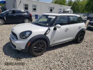 ✅ 2015 MINI Countryman S • VIN: WMWZC5C5XFWT38124 • Lot: 58904875. Listed on Copart with 163,306 mi. Free auction sales archive from the USA and detailed vehicle history report at DreamBid. Image 1.
