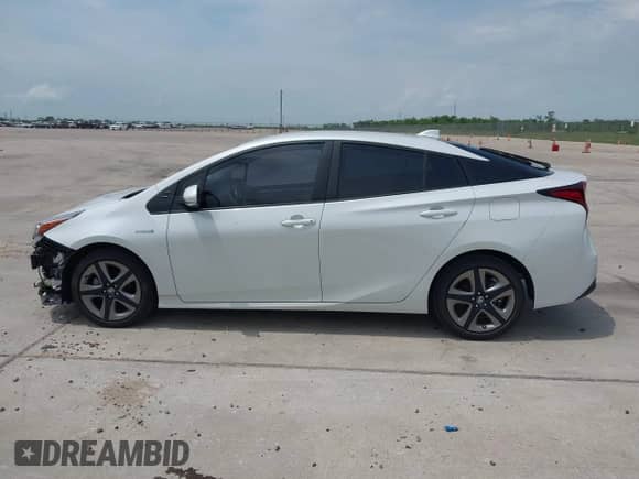2021 Toyota Prius L Eco with VIN JTDKAMFU9M3136865, listed as a IAAI auction lot 42476212 with 16,961 mi miles and . Bid and sale history available at DreamBid. Image 14.