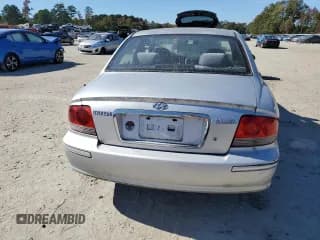 ✅ 2003 Hyundai Sonata • VIN: KMHWF25SX3A818800 • Lot: 82638495. Listed on Copart with 127,008 mi. Free auction sales archive from the USA and detailed vehicle history report at DreamBid. Image 6.