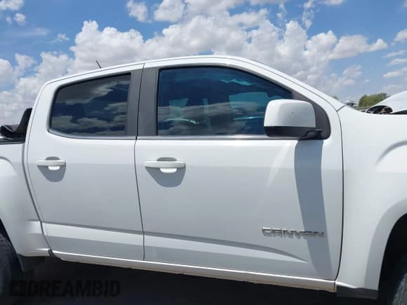 ✅ 2020 GMC Canyon 2WD SLE • VIN: 1GTG5CEN5L1223297 • Лот: 42806221. Опубликован ранее на IAAI с пробегом 120 403 миль. Бесплатный доступ к архиву аукционных продаж из США и подробный отчёт об истории автомобиля на DreamBid. Изображение 13.