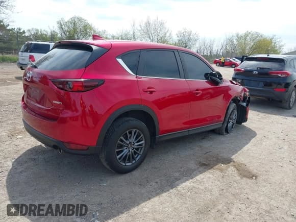 ✅ 2020 Mazda CX-5 Touring • VIN: JM3KFBCM2L0846174 • Lot: 42203758. Wystawiony na IAAI z przebiegiem 58 617 mil. Bezpłatny archiwum sprzedaży aukcyjnych z USA i szczegółowy raport historii pojazdu na DreamBid. Zdjęcie 4.