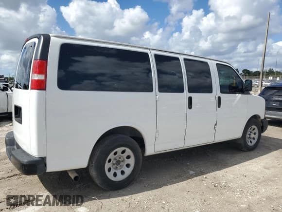 ✅ 2014 Chevrolet Express Passenger LS • VIN: 1GNSGBF44E1147795 • Lot: 90305755. Listed on Copart with 124,358 mi. Free auction sales archive from the USA and detailed vehicle history report at DreamBid. Image 3.