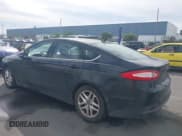 ✅ 2014 Ford Fusion SE • VIN: 3FA6P0HD0ER284272 • Lot: 43682112. Listed on IAAI with 165,428 mi. Free auction sales archive from the USA and detailed vehicle history report at DreamBid. Image 3.