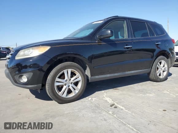 ✅ 2012 Hyundai Santa Fe Limited • VIN: 5XYZK4AG3CG157279 • Lot: 76894754. Listed on Copart with 127,061 mi. Free auction sales archive from the USA and detailed vehicle history report at DreamBid. Image 1.