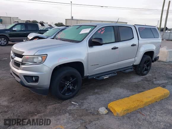 2018 Chevrolet Colorado 2WD LT z VIN 1GCGSCEN2J1229807, wystawiony jako IAAI lot #43391851 z przebiegiem 88 766 mil mil oraz . Historia ofert i sprzedaży dostępna na DreamBid. Obrazek 2.